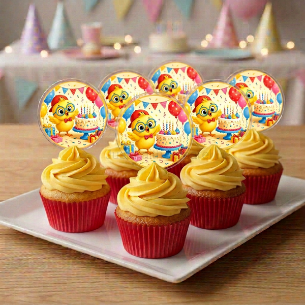 Vanilla cupcakes with golden-brown tops, red wrappers, yellow icing, and chick toppers